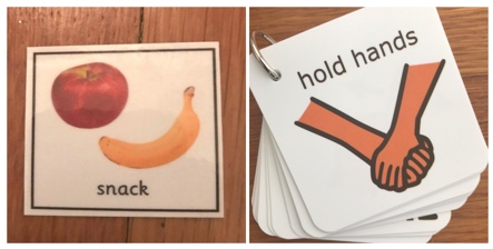 Snack and hold hand to demonstrate pairing words with images for transition
