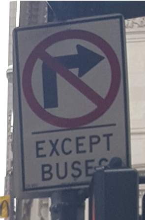 No right turn except buses traffic sign