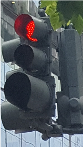 Illuminated red light on a traffic light