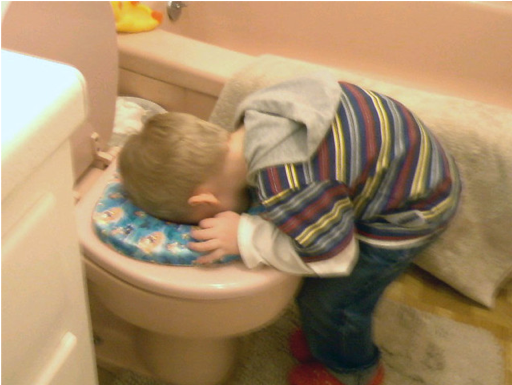 Preschool boy looking in potty