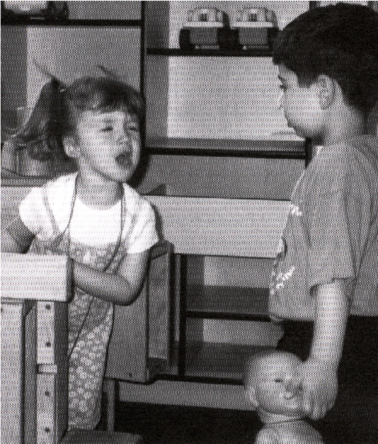 Girl and boy in block center